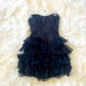 Adorable BEBE dress. I wore it for my prom and a wedding.